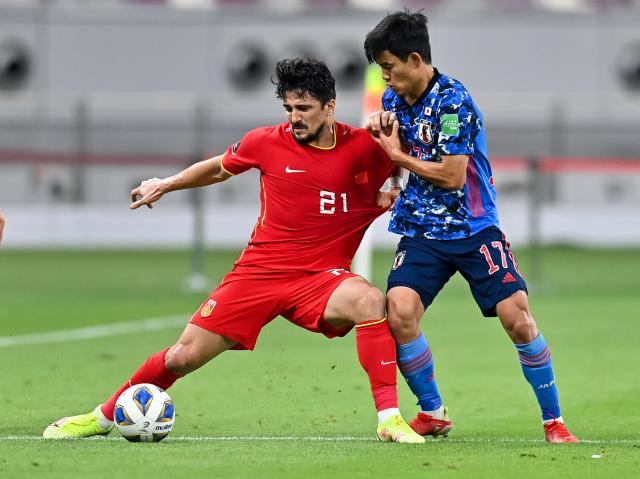 完美电竞官网-洛国富：穿上国足球衣不缺动力 我登场有两套战术